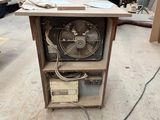 a fan that is sitting on top of a table