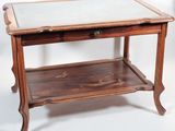 a wooden table with a glass top on it