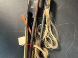 a close up of a pair of scissors and a pair of hair
