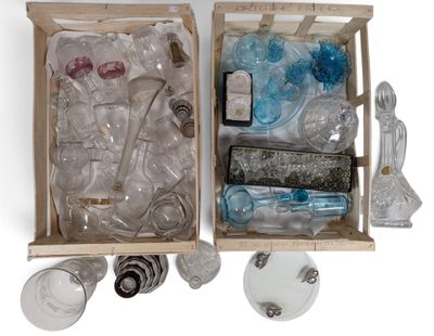 a wooden box filled with empty bottles and other items