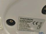 a close up of a white toilet with a label on it