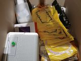 a box full of items that are sitting on the floor