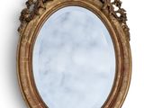 a mirror that is sitting on the wall
