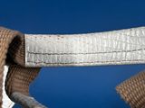 a close up of a piece of cloth on a chair