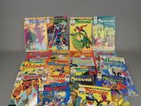 a pile of comic books sitting on top of a table