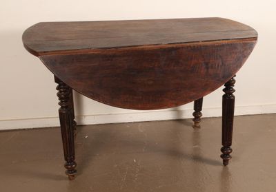 an image of a small table with a wooden top and turned legs