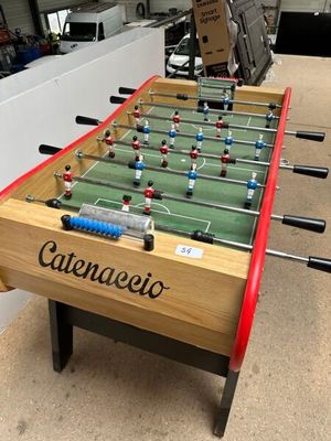 a foosball table in the middle of a room