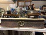 a wooden box sitting on top of a shelf in a room