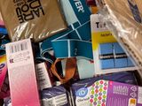 a cardboard box full of toilet paper and other items