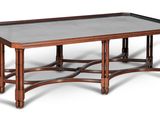 une image représentant une table basse avec un plateau en verre sur fond blanc