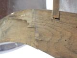 a close up of a piece of wood on a wall