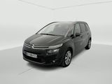 a black citrole is parked in a white room