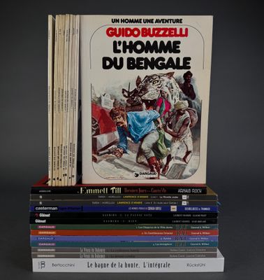 several books are stacked on top of each other on a table