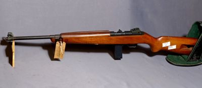 a toy gun that is sitting on top of a table