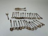 a lot of spoons and spoon spoons on the table