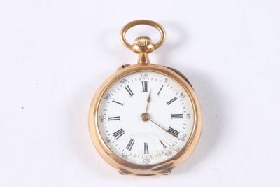 a gold pocket watch with roman numerals on it