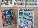 several comics are sitting on a table next to each other