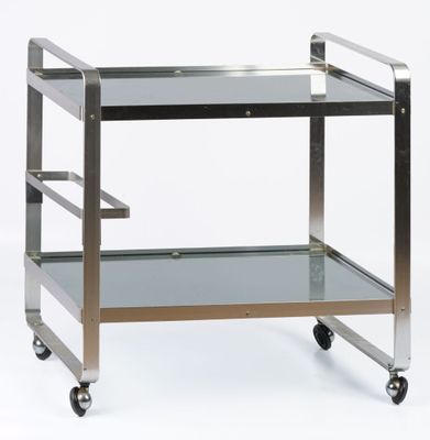 stainless steel and glass serving cart on casteors on a white background