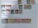 a picture of a refrigerator with a lot of stamps on it