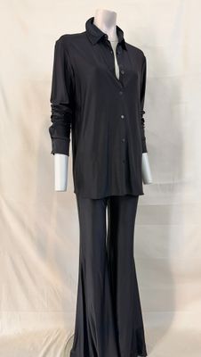the mannequin is wearing a black shirt and black pants