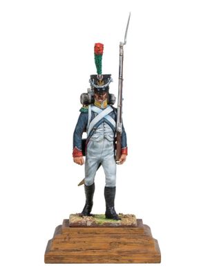a figurine of a soldier in uniform with a sword