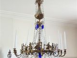 a chandelier that is hanging from the ceiling in a room