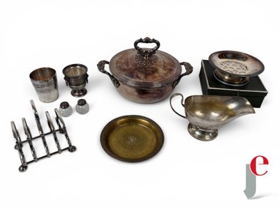 an image of a collection of antique silverware including a teapot, teapot, spoons, and a teapot