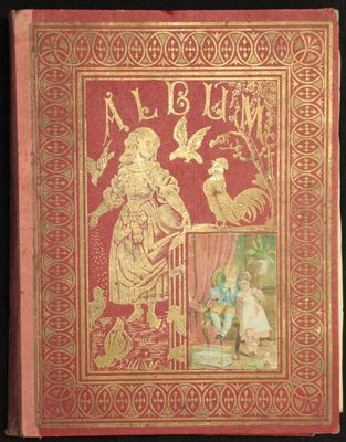 un vieux livre sur lequel figure l'image d'une femme et d'un oiseau