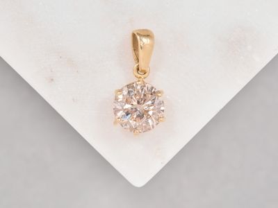 Charmant pendentif en or jaune 18k 750 millièmes retenant un…