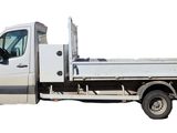 a white truck that is parked on the side of the road