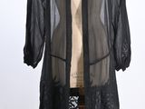 black sheered coat on a mannequin mannequin mannequin mannequin mannequin mannequin mannequin mannequin manne
