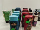 many different types of hair products on the counter