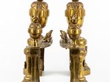 pair of antique brass figurines of a man and a woman