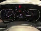 the dashboard of a car with a speedometer, gauges, and a dash light