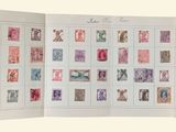 an open book with a bunch of different stamps on it