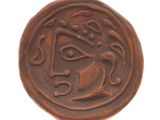 une image d'une pièce de monnaie sur laquelle figure un visage