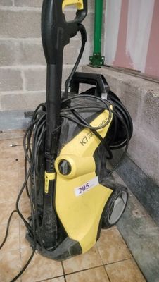 a yellow pressurer that is on the ground