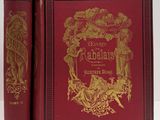 un vieux livre rouge avec un motif doré sur la couverture