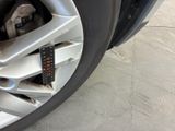 a close up of a tire with a sticker on it