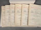 six pages of a recipe book sitting in a box on a table