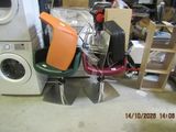 a pile of assorted appliances and appliances in a room