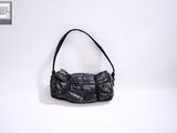 an image of a black purse on a white background