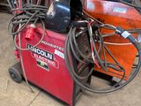 an image of a welding machine in a garage