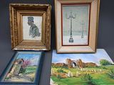 trois tableaux encadrés représentant un homme et une femme dans un paysage
