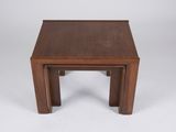 a small wooden table with a small square top on a white background