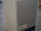 an image of a small refrigerator in a warehouse