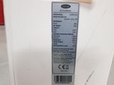 an image of a close up of a label on a refrigerator