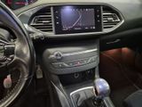 the interior of a car with a steering control and a dashboard