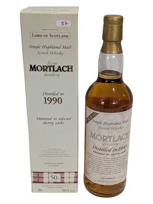 a bottle of mortlach 1990 with box and box