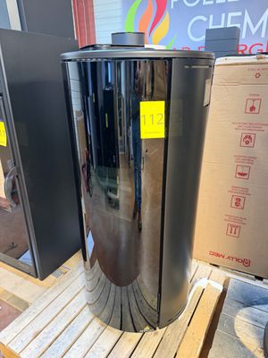 a metal trash can sitting on a pallet in a store